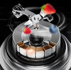 Close-up of a gas stove burner with flames and a strawberry on a black background