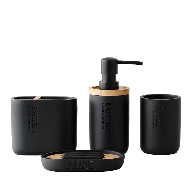 Black bathroom accessory set with 'BRUSH', 'LOTION', 'RAISE', and 'SOAP' labels on a white background.