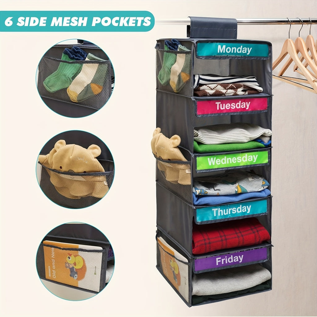 Multifunctional organizer with mesh pockets labeled for each day of the week, used for sorting clothes.